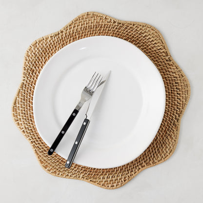 16" Cebu Scalloped Hapao Placemat, handcrafted honey-brown rattan with a traditional weave.