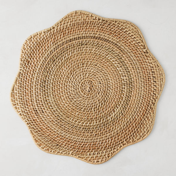 Cebu Scalloped Hapao Placemat, 16" round, natural honey-brown rattan with traditional weave.