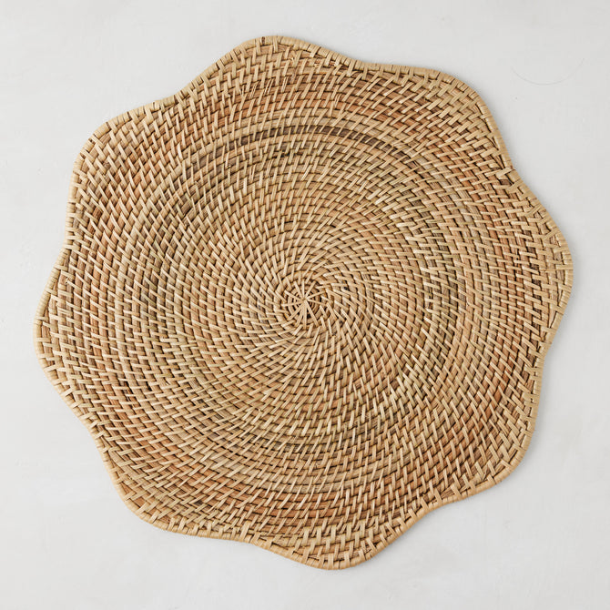 Cebu Scalloped Hapao Placemat, 16" round, natural honey-brown rattan with traditional weave.
