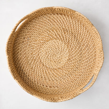 Cebu Scalloped Tray, 16"Dia, honey-brown hapao rattan with handles and curved edges.
