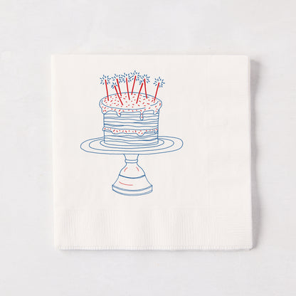 White 3-ply paper cocktail napkin with a blue and red "Celebration Cake" design, 5.5" square.