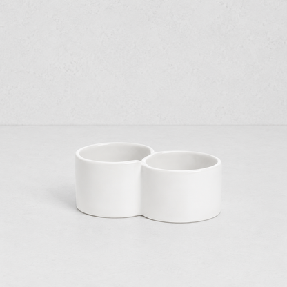 Creamy white ceramic double appetizer bowl by Montes Doggett, 6.25"Dia x 2.5"H.