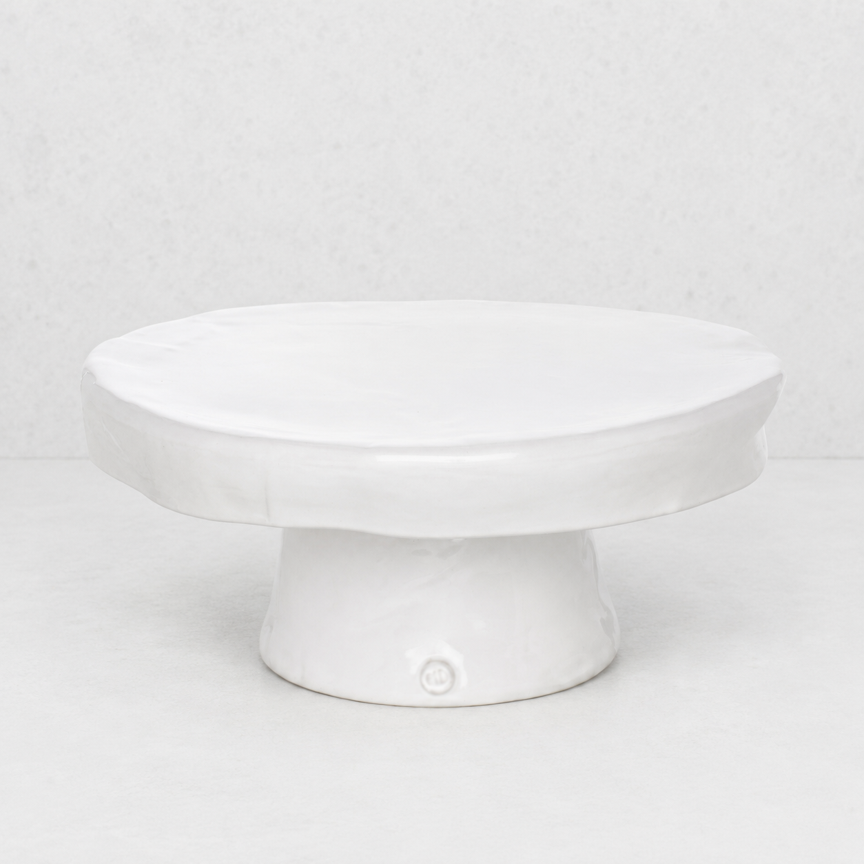 Montes Doggett large white ceramic cake stand, handmade in Peru.