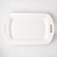 White ceramic serving platter with elegant handles, 13"W x 21"L, high-fired earthenware.
