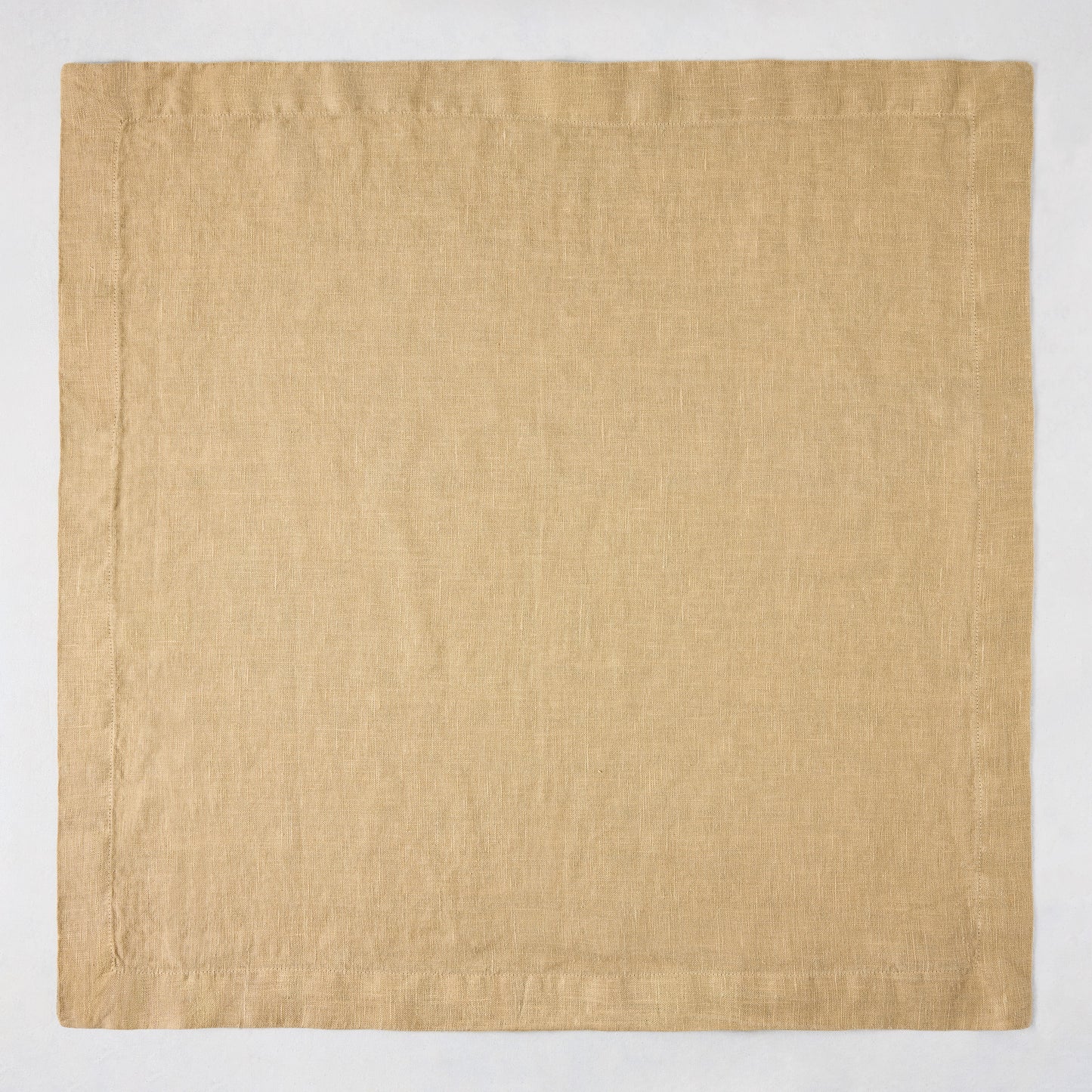 Chai HG Signature hand-dyed 22" square linen napkin, creamy nutmeg color, mitered corners.