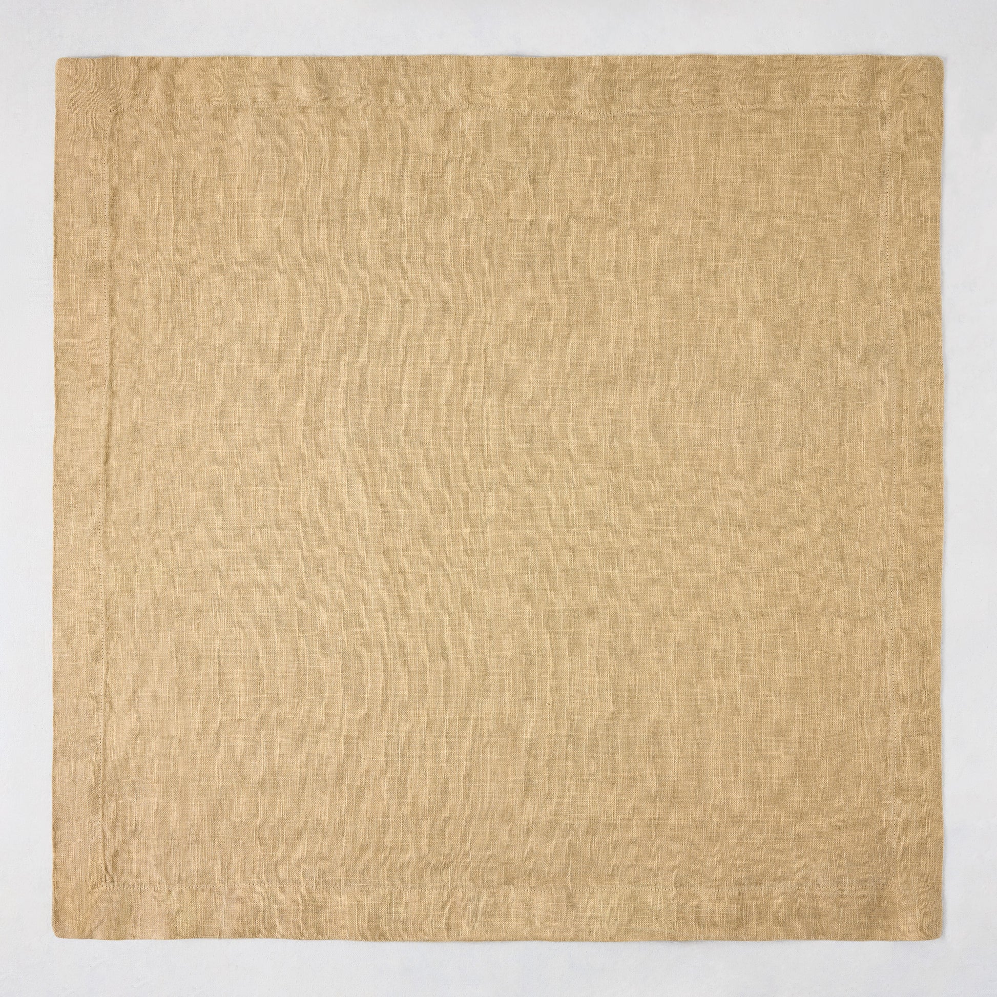 Chai HG Signature hand-dyed 22" square linen napkin, creamy nutmeg color, mitered corners.