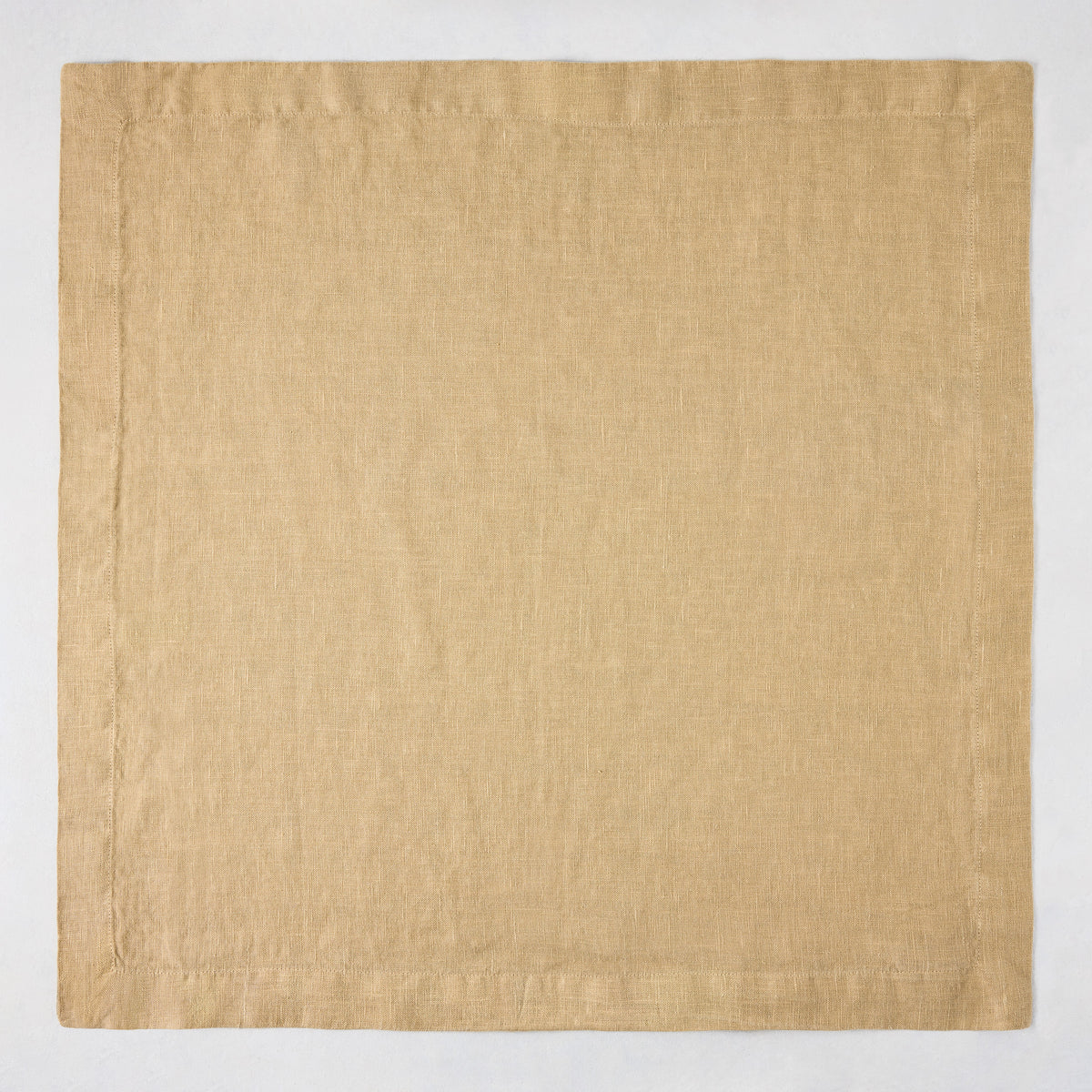 Chai HG Signature hand-dyed 22" square linen napkin, creamy nutmeg color, mitered corners.