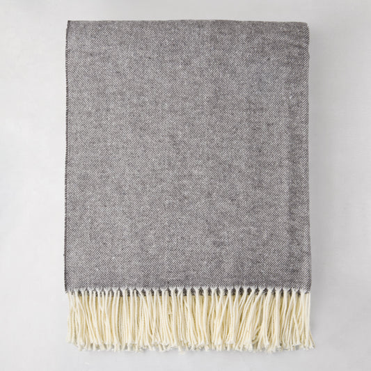 Charcoal Italian Herringbone Throw Blanket, 51"x67", with cream fringe, folded.