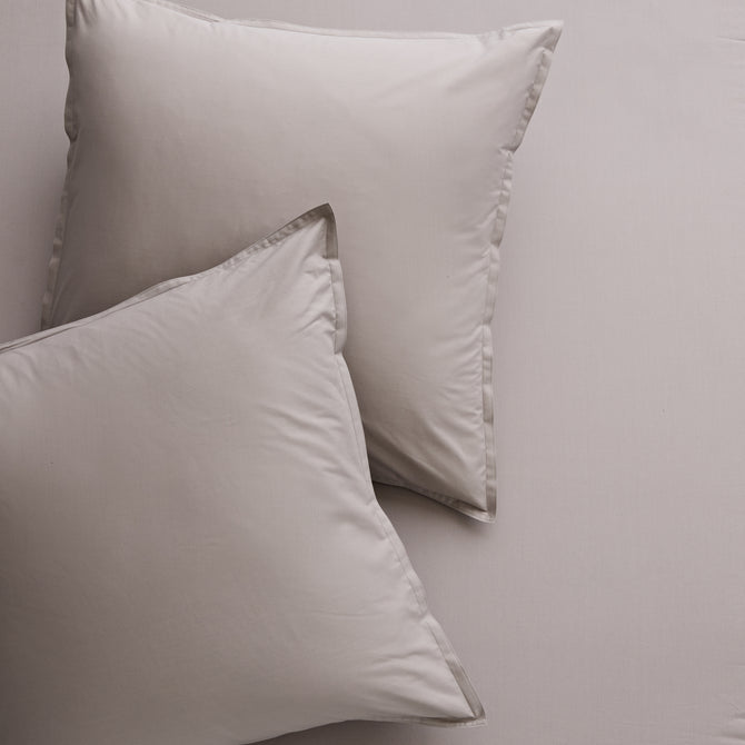 Two Charcoal Grey Italian Percale Euro Shams with envelope closures, shown on matching bedding.