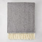 Charcoal Italian Herringbone Throw Blanket, 51"x67", with cream fringe, folded.