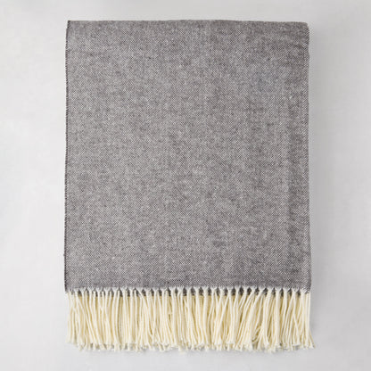 Charcoal Italian Herringbone Throw Blanket, 51"x67", with cream fringe, folded.