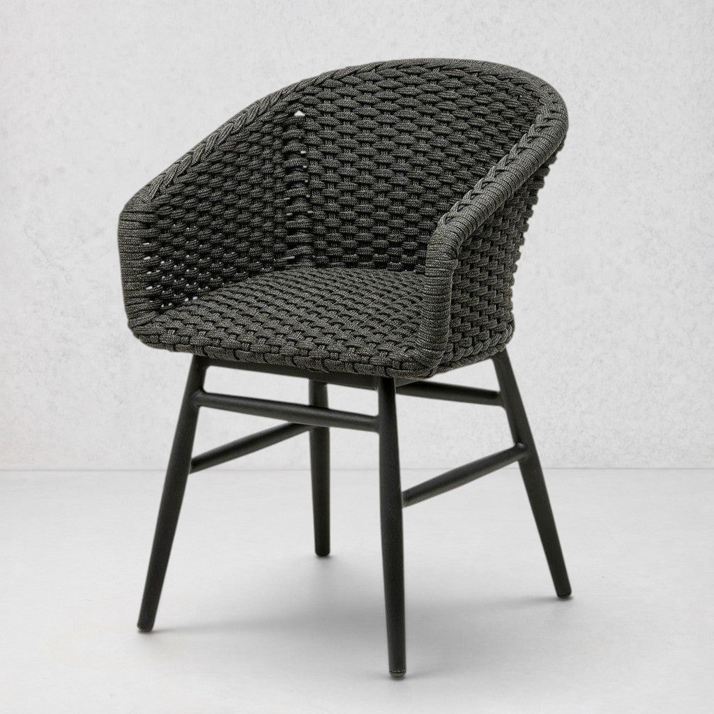 Charly Black Rope Dining Arm Chair with woven PE resin wicker seat and matte black aluminum frame.