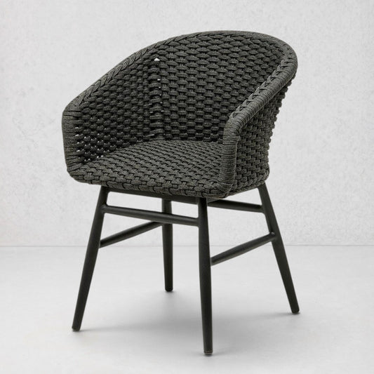Charly Black Rope Dining Arm Chair with woven PE resin wicker seat and matte black aluminum frame.