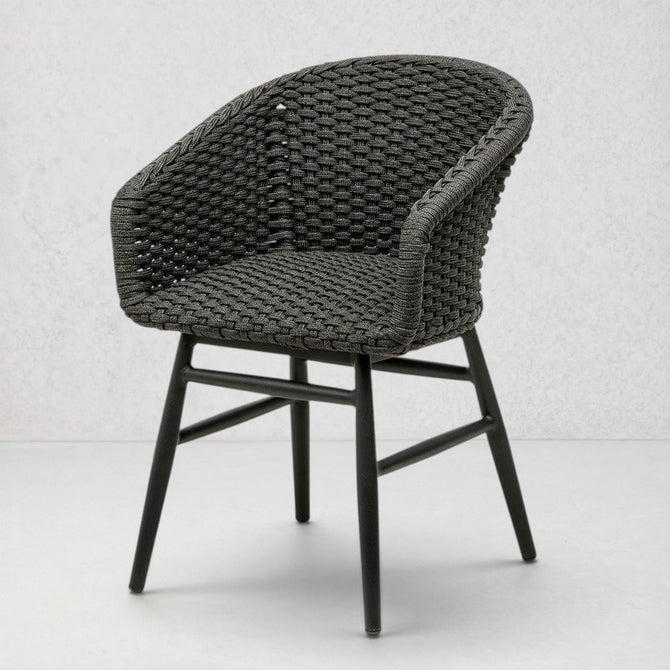 Charly Black Rope Dining Arm Chair with woven PE resin wicker seat and matte black aluminum frame.