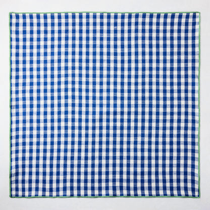 Chatham Blue Gingham Cotton Napkin, 22" square, with green embroidered trim.