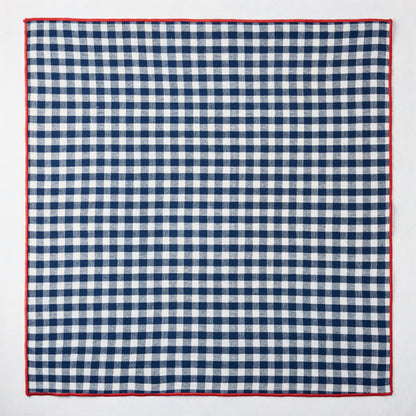 Chatham Navy Blue Gingham Cotton Napkin, 22" square, with red embroidered trim.