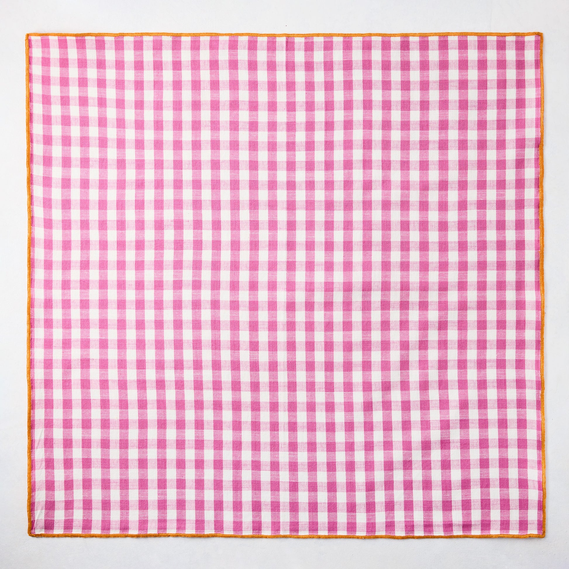 Chatham Pink Gingham Cotton Napkin with Orange Trim, 22" square.