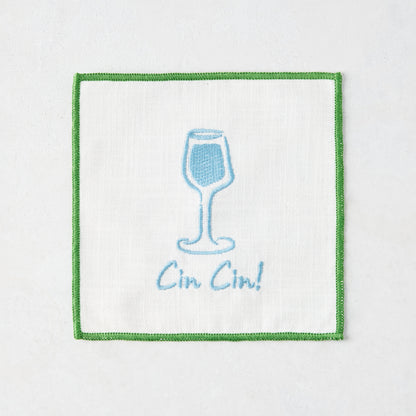 White cotton coaster with blue embroidered cocktail glass and "Cin Cin!" text, green border.