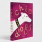 Chic Dogs hardcover coffee table book with a magenta cover, gold lettering, and a white dog illustration.