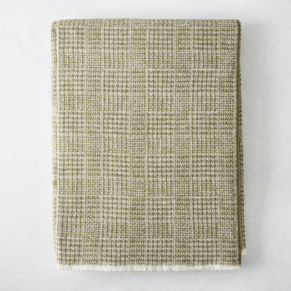 Chive green Sutton Houndstooth throw blanket, 51"x67" cotton-acrylic blend with raw edge.