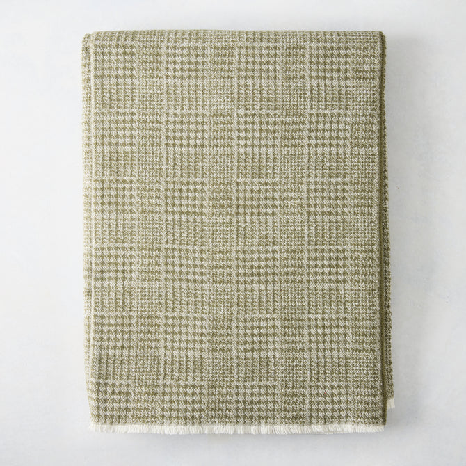Chive green Sutton Houndstooth throw blanket, 51"x67" cotton-acrylic blend with raw edge.