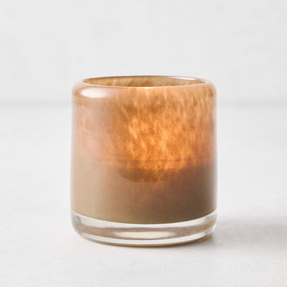 Small mouth-blown chocolate brown glass votive candle holder, 2.75 inches tall with a translucent, textured finish.