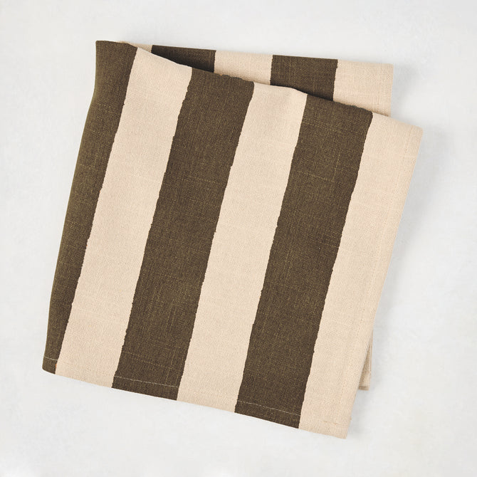 Folded Chocolate Brown Hampton Stripe natural cotton napkin, 22" square.