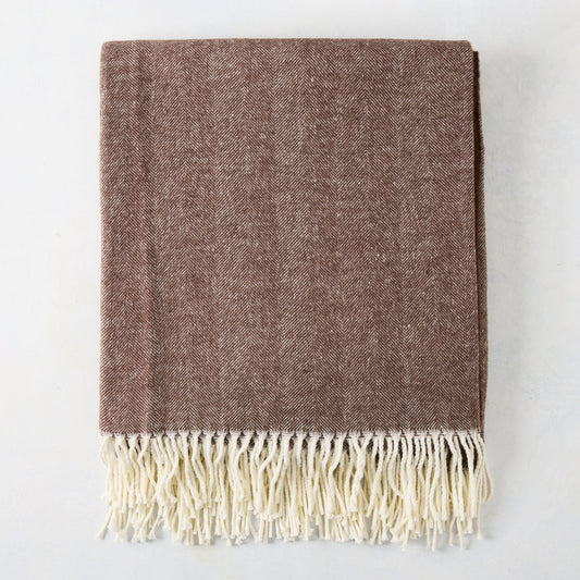 Chocolate brown Italian herringbone throw blanket with cream fringe.