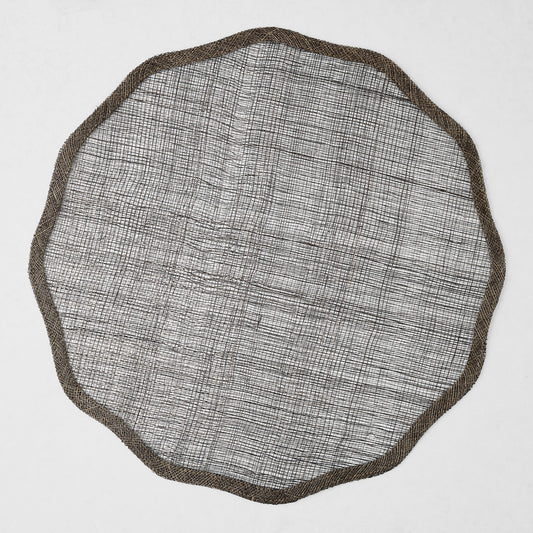 16-inch round chocolate brown abaca fiber placemat with a semi-transparent woven texture and scalloped border.