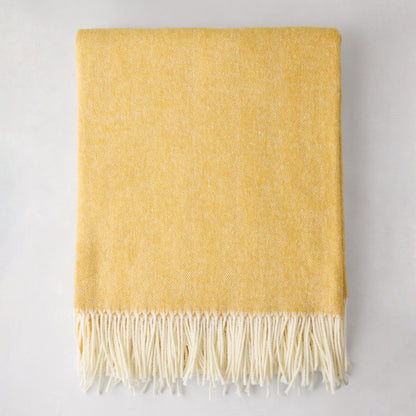 Cider yellow Italian herringbone throw blanket with white fringe, 50% cotton, 50% soft acrylic.
