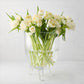 Cis Small Scissor-Cut Glass Bowl with three feet, holding a bouquet of white tulips.