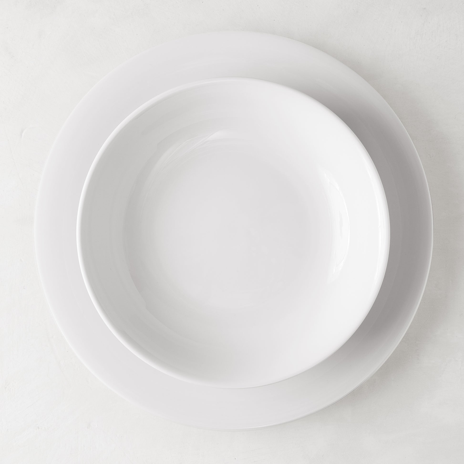 HG City White Porcelain Dinner Plate, 11" diameter, with a matching bowl nested on top.