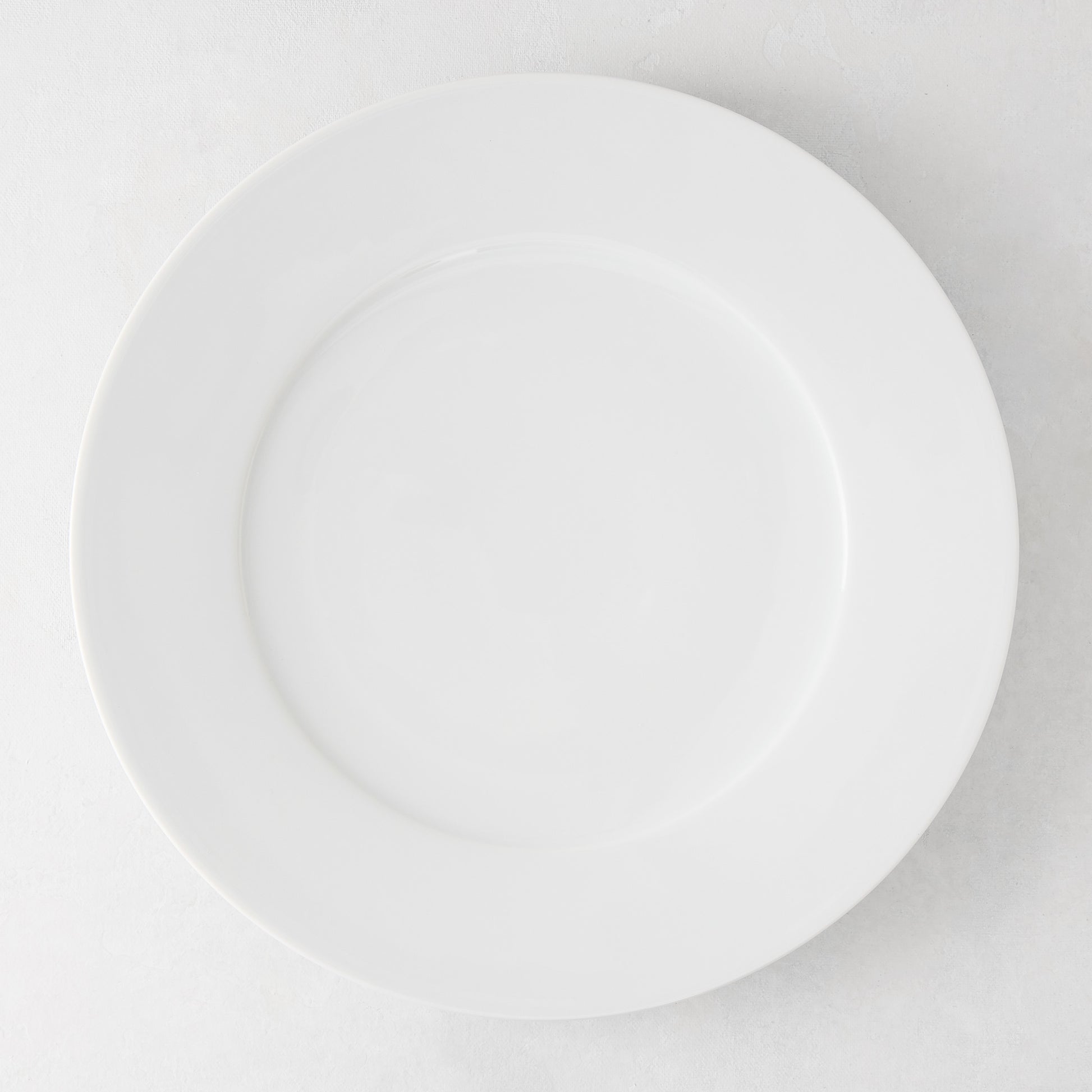 HG Classic 11" white porcelain dinner plate with clean, crisp lines.