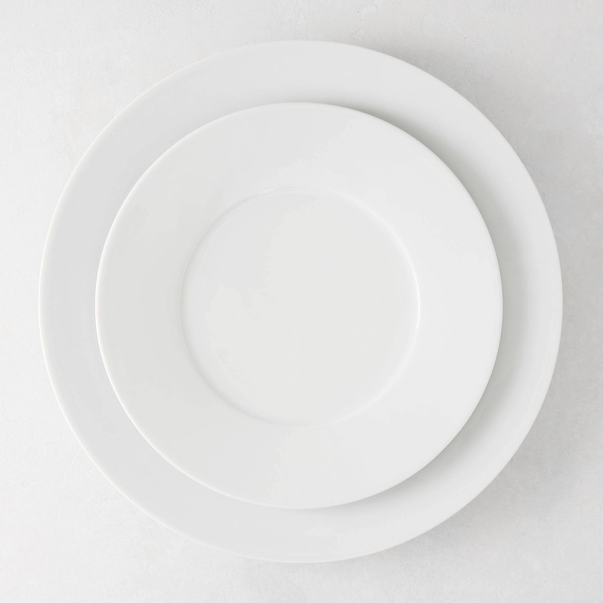 HG Classic Porcelain Salad Plate, 8.5" diameter, stacked on a larger white plate.