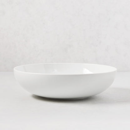 HG Classic 10.5" white porcelain serve bowl with a sleek, simple shape.