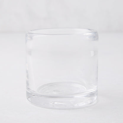 Clear glass votive candle holder, 2.75"Dia x 2.75"H, mouth-blown and hand-formed.