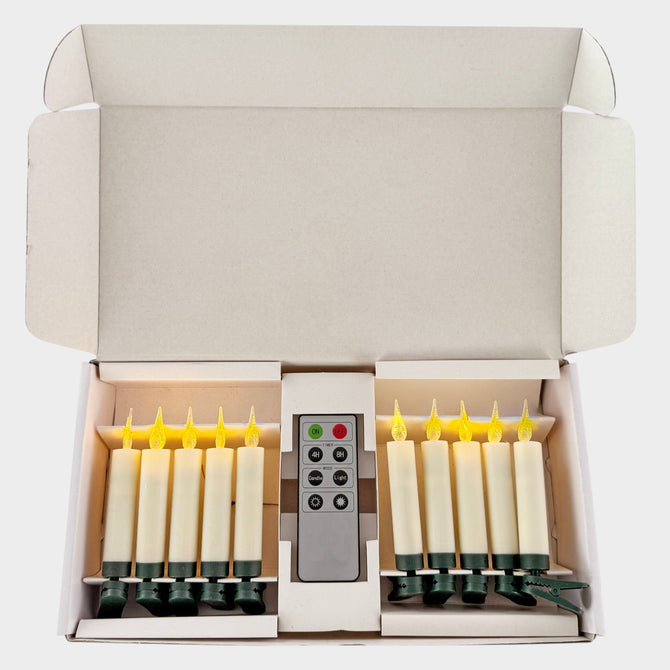 Set of 10 ivory LED clip-on Christmas tree candles with green clips and a remote control in a white storage box.