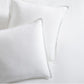 Set of two cloud white European washed linen euro shams with a soft, textured finish and flange edges.