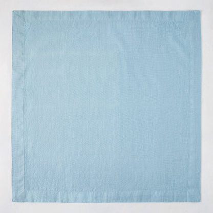 Cloudy HG Signature hand-dyed 22-inch square linen napkin with mitered corners.