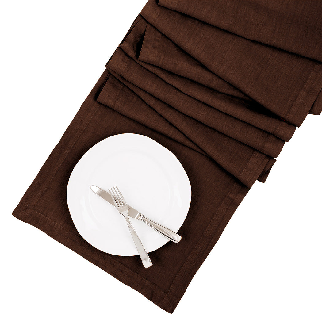 Cocoa HG hand-dyed linen table runner, 18" x 108", with white plate and silverware.