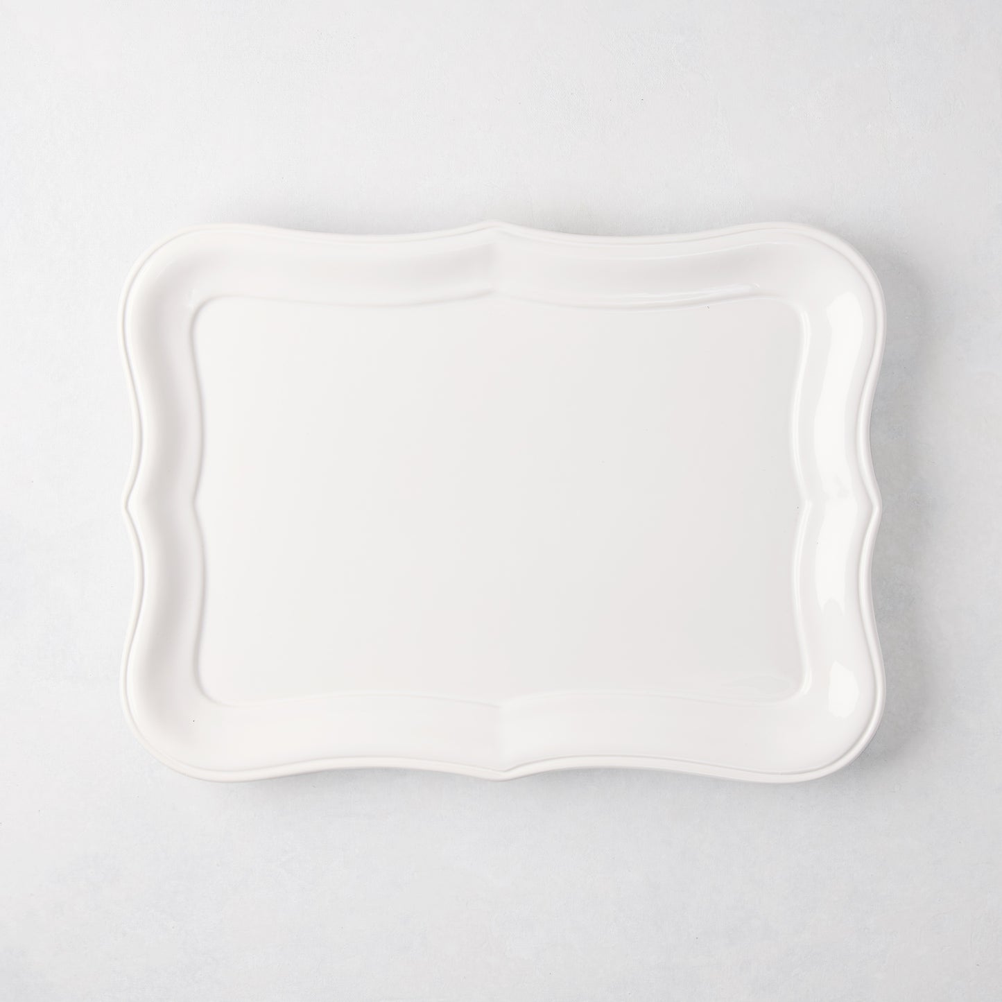 Colette Medium Ceramic Serving Platter, white with scalloped edges, 15.7"L x 11.4"W.