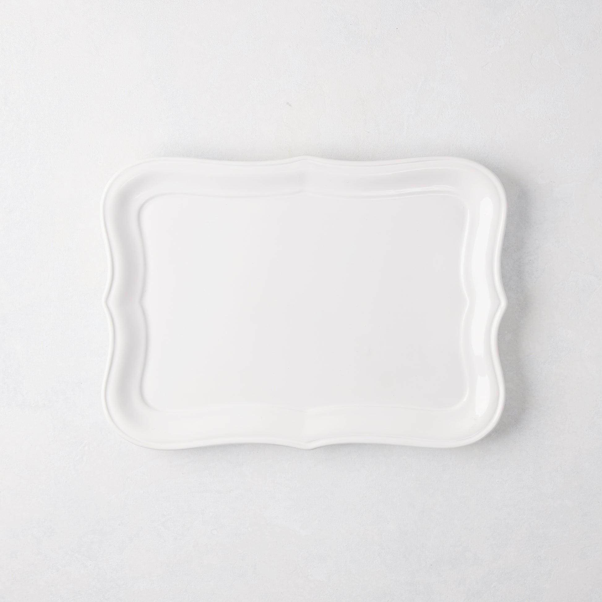 Colette Small Ceramic Serving Platter, white glaze, subtle scalloped edge, 12.6"L X 9"W.