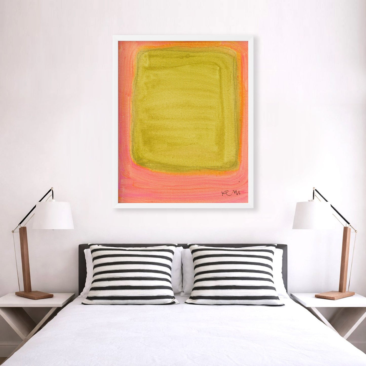 Color Note 1 Art Print by Kerri Rosenthal, abstract yellow-green rectangle on a pink background, white frame, above a bed.