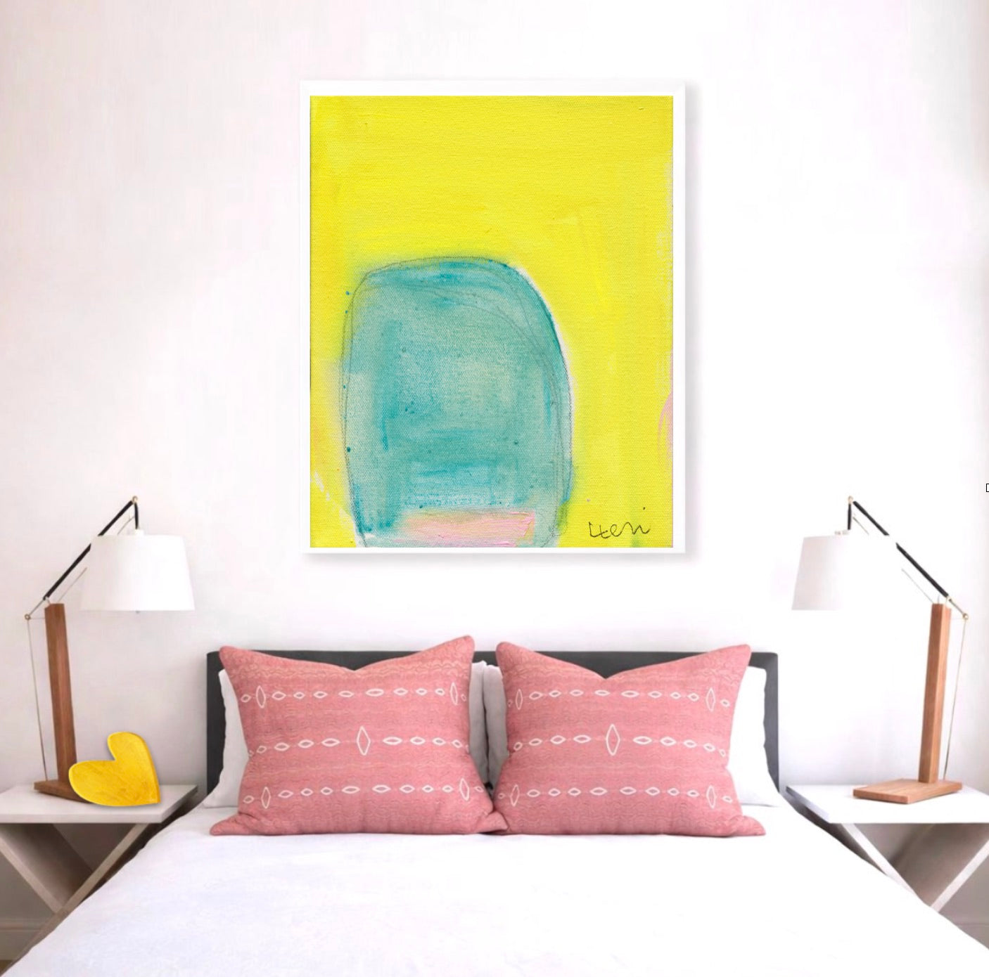 Color Note 4 Art Print by Kerri Rosenthal, abstract yellow and teal painting in a white frame above a bed.
