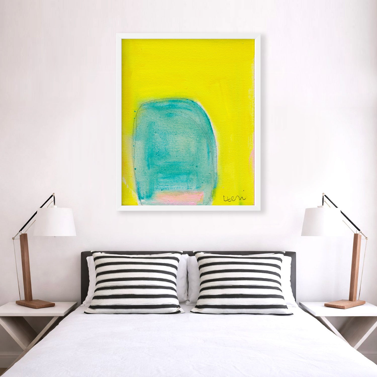 Kerri Rosenthal Color Note 4 Art Print: vibrant yellow and teal abstract painting in a white frame above a bed.