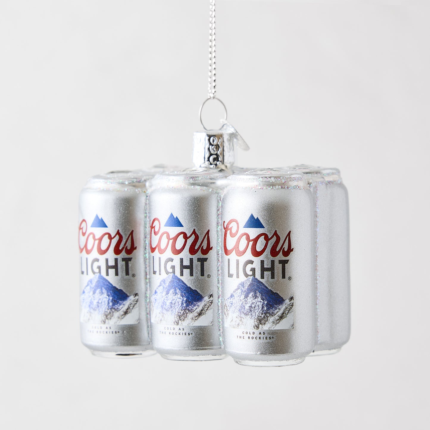 Coors Light six-pack glass Christmas ornament with silver glitter finish and detailed beer can branding.
