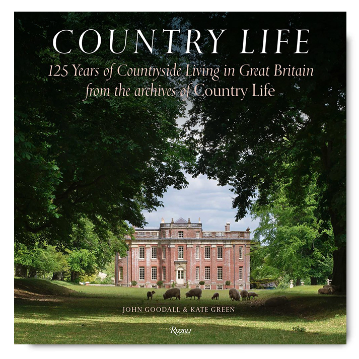 Hardcover book titled Country Life featuring a red brick manor house and sheep in a green meadow.