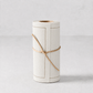 Roll of 50 cream-colored cotton cocktail napkins with a delicate dotted border, tied with a natural twine string.