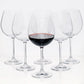 Set of 6 clear crystal Burgundy stem wine glasses, one filled with red wine.