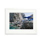 Da Luigi Ai Faraglioni framed wall art print with blue umbrellas, beachgoers, and clear water.